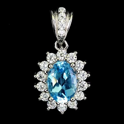 Colgante de plata de ley 925 ovalado topacio azul suizo 7x5 mm joyas de piedras preciosas naturales Foto 1 de 4