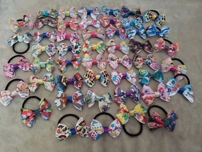 Handmade ribbon bow bundle. Mixture of shapes, sizes & colours - Image 1 of 4