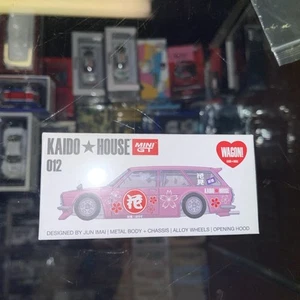 1/64 MINI GT KAIDO HOUSE DATSUN 510 WAGON HANAMI V2 PINK #012 (SEALED) - Picture 1 of 5