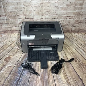 Impresora HP Laserjet P1006 LaserJet CB411A con tóner y cable de alimentación - Probada - Imagen 1 de 9