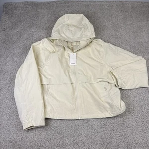 Quitte Winddichte Übergangsjacke mit Kapuze Tofu L Neu mit Etikett - Bild 1 von 9