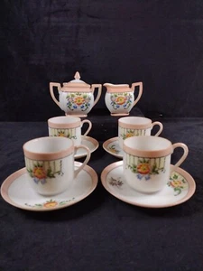 Crema e zucchero vintage Giappone occupato con quattro tazze e piattini - Foto 1 di 12