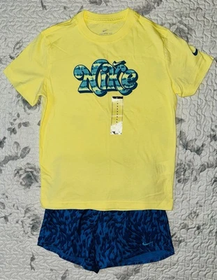 Conjunto de camiseta amarilla y pantalones cortos azules Nike para niñas talla/pequeña (8-9) Foto 1 de 4