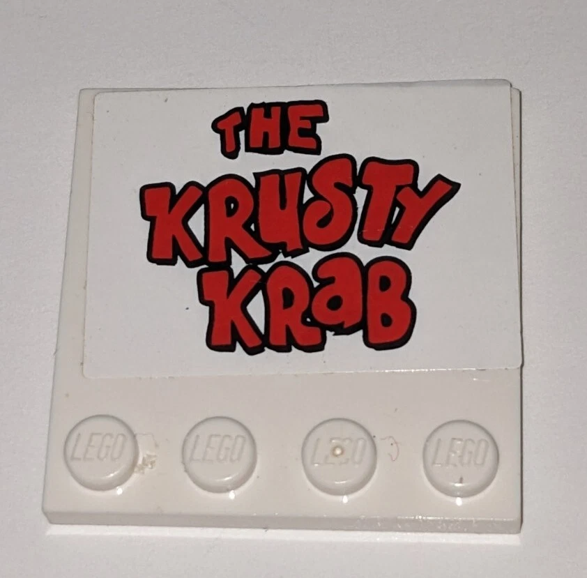 LEGO White 4x4 Spongebob Krusty Krab Edge Stud Specialty Tile Sign Part Piece - Image 1 of 2