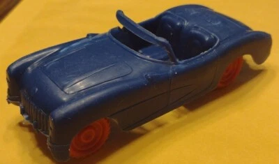Vintage 1953 (?) Coche de juguete antiguo de plástico azul Chevrolet Corvette ruedas rojas raro Foto 1 de 4
