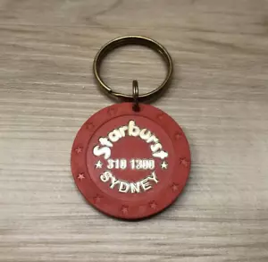 Portachiavi portachiavi chip casinò attrezzatura da gioco vintage STARBURST Sydney Australia - Foto 1 di 2