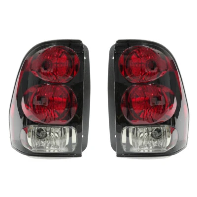 Conjunto de lámpara de luz trasera derecha izquierda OEM NUEVO (2) 02-09 Chevrolet Trailblazer Foto 1 de 2