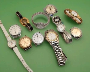 LOT OF 12 TIMEX QUARTZ AND MECHANICAL TIMEX WATCH FOR PARTS AS IS - Picture 1 of 9