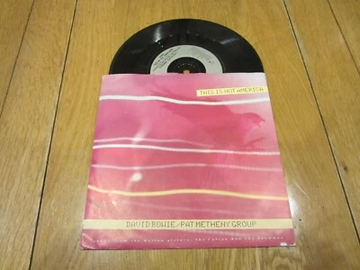 DAVID BOWIE / PAT METHENY GROUP - This Is Not America - 1985 7" vinyl single.. - Image 1 of 4