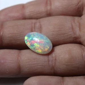 4,1 kt 14,9 x 9,5 mm Natürlicher AAA Grün Rot Feuer Äthiopischer Opal Oval Cabochon - Bild 1 von 13