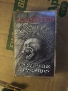 The Exploited *Beat The Bastards *cassette tape *VG+/NM *1996 *Triple X *51220-4