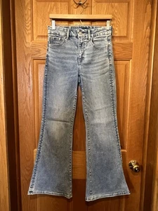 Pantalones de mezclilla para mujer BU45 American Eagle elásticos tiro súper alto acampanados azules talla 6 - Imagen 1 de 4