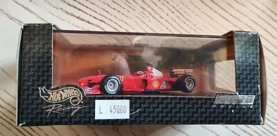 HOT WHEELS FORMULA 1 1:43 M. SCHUMACHER FERRARI F 2000 CAMPIONE DEL MONDO 2000 - Immagine 1 di 4