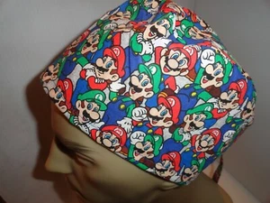 Men's Medical Surgical scrub hat cartoon characters packed all over. Ties in bac - Picture 1 of 6