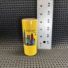 “Chicago” souvenir Yellow shot glass with red heart and multicolor skyscraper.