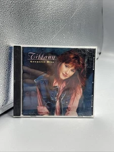 TIFFANY Greatest Hits (CD Oct-1996) I THINK WE'RE ALONE NOW OOP - Foto 1 di 1