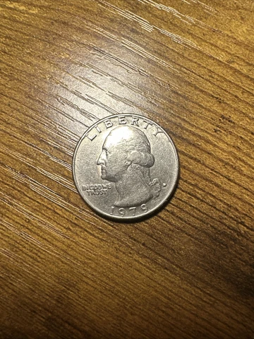 1979 D Washington Quarter in nice condition. Filled In Mint Mark Cover
