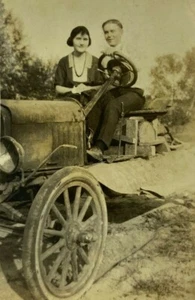 Man & Woman Sitting On Farm Truck B&W Photograph 2.5 x 4.5 - Picture 1 of 3