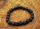 Bracelet perles en pierre de lave noire possédant des propriétés curatives et look magnifique