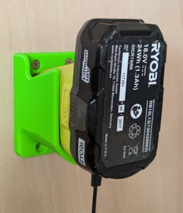 Caricabatteria Ryobi One+ "click fit" BCL14183H supporto a parete - Foto 1 di 16