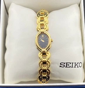 Orologio da donna NOS Vinatage Seiko quadrante nero ovale tono oro delicato art deco nuovo con scatola - Foto 1 di 11