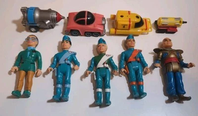 Vintage Thunderbirds Figure Lot - 5 Figurines, 3 Pullback Cars, 1 Miniature Car - Image 1 of 4