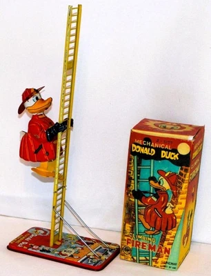 EX! DISNEY 1950's "DONALD DUCK CLIMBING FIREMAN" TIN TOY BY LINEMAR + RE-PRO BOX - Image 1 of 4