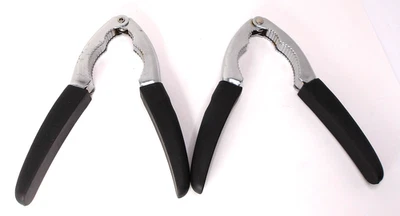 2 galletas de mariscos/nueces, acero inoxidable/silicona, cargadas con espinas, negras, 7 pulgadas Foto 1 de 4