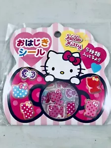 Sanrio Hello Kitty flat plastic marble Ohajiki style sack of stickers Japan 2012 - Picture 1 of 3