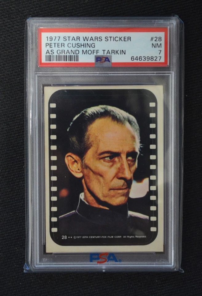 1977 Topps Star Wars STICKERS 28 PETER CUSHING AS GRAND MOFF TARKI PSA 7 *SC702* - Image 1 of 1
