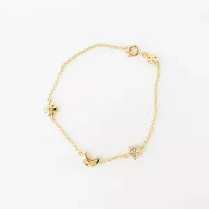 Pulsera Tory Burch Estrella Luna Dije Logo Oro OS - Imagen 1 de 12