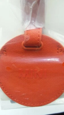 Nova Bagagem Redonda Genuína Mini Cooper Tag Fabricante de Equipamento Original em Coral 80212460869 MC8-091 - Imagem 1 de 3