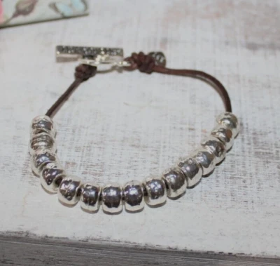 Pulsera American Eagle LIVE YOUR LIFE cuentas de plata y cuerda marrón Foto 1 de 4