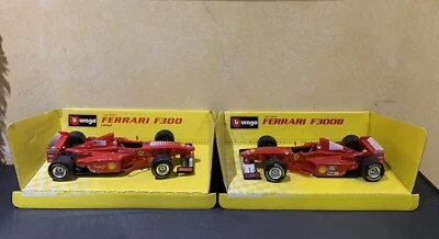Burago Michael Schumacher Ferrari F300 1996 + Ferrari F300B Scala 1/24 - Immagine 1 di 3