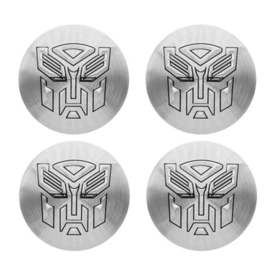 4x Pegatinas Plateadas Transformers Autobot Logo Coche Rueda Centro Tapacubos Insignia 56MM Foto 1 de 4