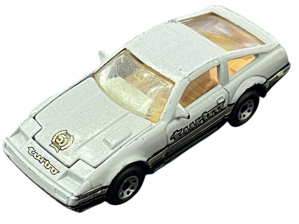 Matchbox Nissan 300ZX Turbo Diecast 1986 gris y negro como nuevo 1:58 Macao Foto 1 de 4