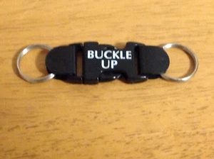 Vintage BUCKLE UP Seatbelt Style Keychain Key Ring Hangtag - Picture 1 of 3