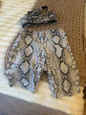 Juego Onzie estampado animal pequeño Foto 1 de 4