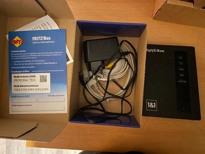AVM FRITZ!Box 7412 - ADSL2+ Router mit WLAN N mit VoIP & DECT 1und1 - Bild 1 von 4