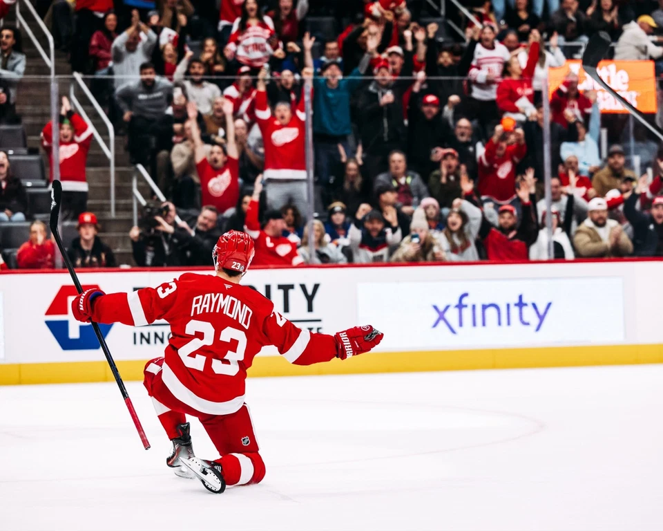 Lucas Raymond on Ice Celebration Detroit Red Wings 8x10 NHL Hockey Photo - Image 1 of 1