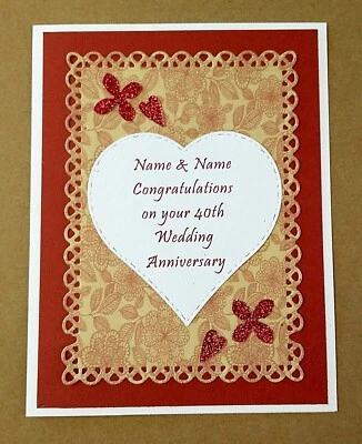 Tarjeta de felicitación del 40 aniversario de boda con nombres y verso personalizados en el interior  Foto 1 de 4