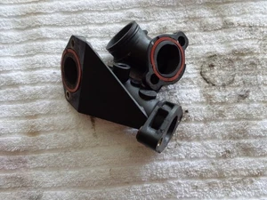 Admisión Briggs And Stratton 592842 y codo 697122 (25JY9) - Imagen 1 de 3