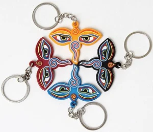 SCHLÜSSELANHÄNGER " BUDDHA EYES " IN VERSCHIEDENEN FARBEN  KATHMANDU NEPAL - Bild 1 von 5