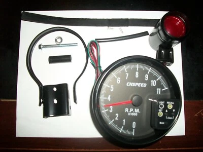 FMR 0-11,000 RPM, 5" TACHOMETER WITH SHIFT LIGHT AND RECALL W/MOUNTING BRACKET - Image 1 of 4