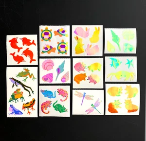 11 ALL IRIDESCENT ANIMAL SEA SHELL INSECT OCEAN DOLPHIN sticker MODS PEARLY HOLO - Picture 1 of 7