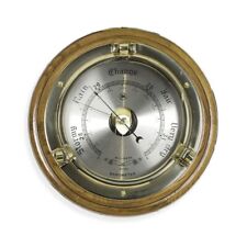 Lacquered Brass Porthole Barometer on Oak Wood