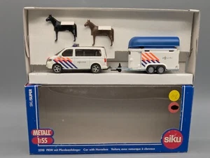 Maquetas de coches 1:55 Siku 2310 Volkswagen VW TURISMOS + remolque para caballos con 2 caballos embalaje original - Imagen 1 de 13