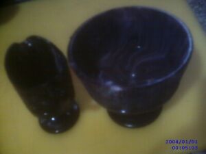 two pieces of collectable,purple slag glass.
