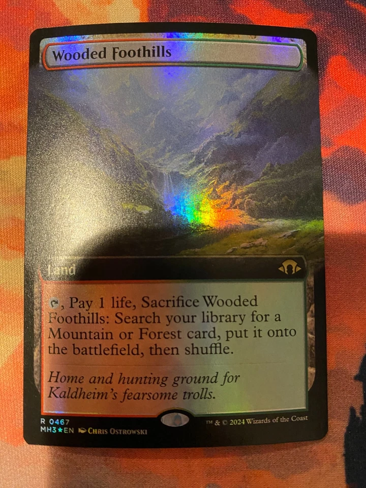 MTG Modern Horizons 3 Wooded Foothills Extended Art Foil - Image 1 of 1