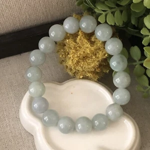 12 mm Icy Tint Green Jade Jadeite Bead Bracelet - Picture 1 of 5